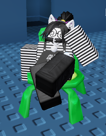 a roblox screenshot of Clancy's avatar sitting in an Animal Crossing froggy chair, in a "chill" pose